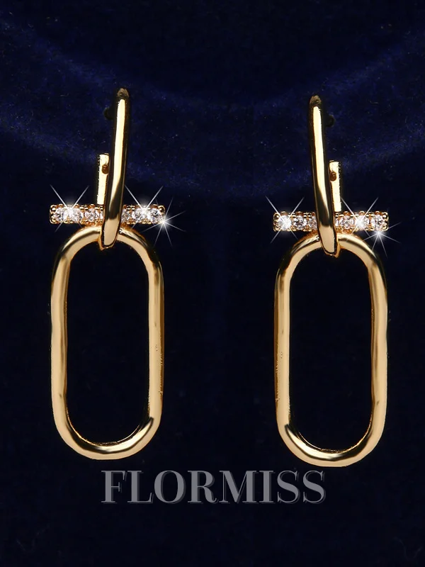 Grasiøse metall med rhinestone øredobber
